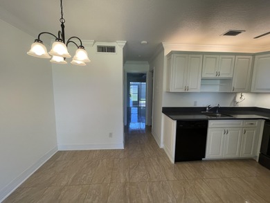 55 OR OLDER ONLYpletely renovated 1ST FLOOR UNIT. GOLF COURSE on Pine Lakes Golf Club in Florida - for sale on GolfHomes.com, golf home, golf lot