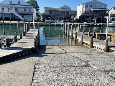 BUILDABLE PARCEL! Neptune Drive is a paved road the entire way on Captains Cove Golf and Yacht Club in Virginia - for sale on GolfHomes.com, golf home, golf lot