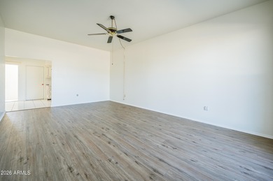 Enjoy easy, lock and leave 55+ living in the heart of Sun City on Sun City Lakes West and East in Arizona - for sale on GolfHomes.com, golf home, golf lot