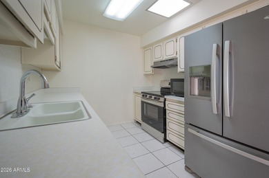 Enjoy easy, lock and leave 55+ living in the heart of Sun City on Sun City Lakes West and East in Arizona - for sale on GolfHomes.com, golf home, golf lot