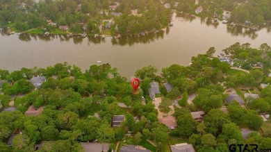 Welcome to your dream home in the serene community of Hideaway on Hide-A-Way Lake Golf Course in Texas - for sale on GolfHomes.com, golf home, golf lot