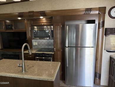 Wow, what a deal!  This is an amazing lot and camper for a great on Bent Creek Golf Course in Tennessee - for sale on GolfHomes.com, golf home, golf lot