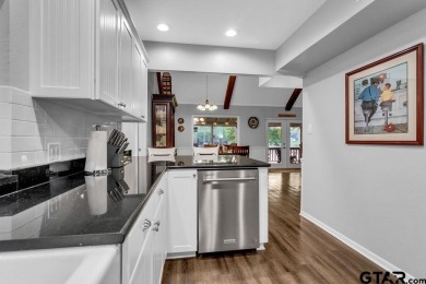 Welcome to your dream home in the serene community of Hideaway on Hide-A-Way Lake Golf Course in Texas - for sale on GolfHomes.com, golf home, golf lot