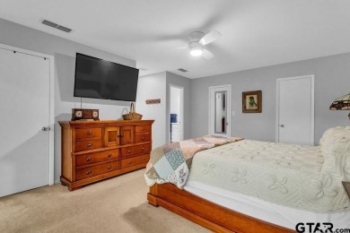 Welcome to your dream home in the serene community of Hideaway on Hide-A-Way Lake Golf Course in Texas - for sale on GolfHomes.com, golf home, golf lot