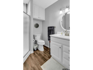 Welcome to your dream home in the serene community of Hideaway on Hide-A-Way Lake Golf Course in Texas - for sale on GolfHomes.com, golf home, golf lot