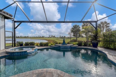 Under contract-accepting backup offers. This stunning residence on Lakewood National Golf Club in Florida - for sale on GolfHomes.com, golf home, golf lot