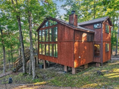 Welcome to 1746 Sonnenblick Drive -- a stunning chalet retreat on Innsbrook Resort Golf Course in Missouri - for sale on GolfHomes.com, golf home, golf lot