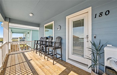 Welcome to this stunning 2021 built stilt style coastal retreat on Palmilla Beach Golf Club in Texas - for sale on GolfHomes.com, golf home, golf lot