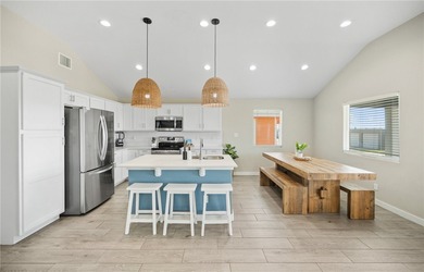 Welcome to this stunning 2021 built stilt style coastal retreat on Palmilla Beach Golf Club in Texas - for sale on GolfHomes.com, golf home, golf lot