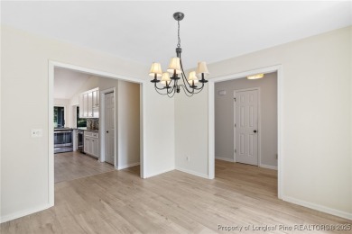 Beautiful flowing split bedroom ranch floor plan situated on the on Carolina Trace Country Club in North Carolina - for sale on GolfHomes.com, golf home, golf lot