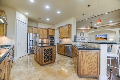 Offered for sale for the first time, this custom single story on Palmer Lakeside At Barton Creek in Texas - for sale on GolfHomes.com, golf home, golf lot