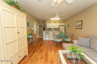 Incredibly well-maintained top floor condo overlooking the golf on Sea Trail Golf Resort in North Carolina - for sale on GolfHomes.com, golf home, golf lot