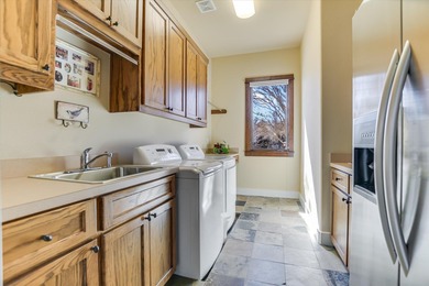 Offered for sale for the first time, this custom single story on Palmer Lakeside At Barton Creek in Texas - for sale on GolfHomes.com, golf home, golf lot