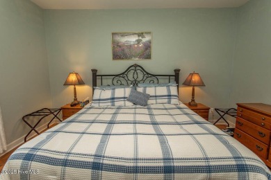 Incredibly well-maintained top floor condo overlooking the golf on Sea Trail Golf Resort in North Carolina - for sale on GolfHomes.com, golf home, golf lot
