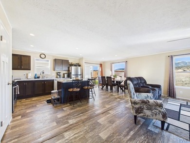 This well-maintained 3-bedroom, 2-bathroom manufactured home on Hollydot Golf Course in Colorado - for sale on GolfHomes.com, golf home, golf lot