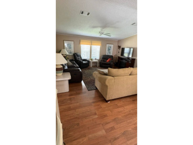 This move-in-ready gem has 2 bedrooms, 2 baths, and is located on Sabal Springs Golf and Racquet Club in Florida - for sale on GolfHomes.com, golf home, golf lot