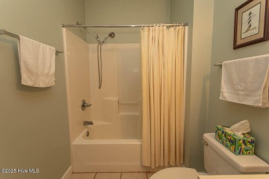 Incredibly well-maintained top floor condo overlooking the golf on Sea Trail Golf Resort in North Carolina - for sale on GolfHomes.com, golf home, golf lot