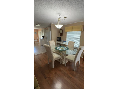 This move-in-ready gem has 2 bedrooms, 2 baths, and is located on Sabal Springs Golf and Racquet Club in Florida - for sale on GolfHomes.com, golf home, golf lot
