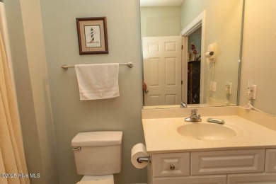 Incredibly well-maintained top floor condo overlooking the golf on Sea Trail Golf Resort in North Carolina - for sale on GolfHomes.com, golf home, golf lot
