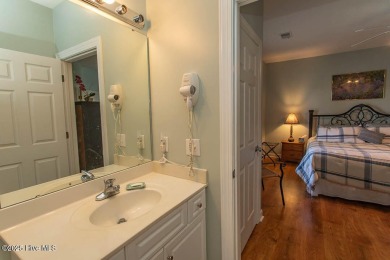 Incredibly well-maintained top floor condo overlooking the golf on Sea Trail Golf Resort in North Carolina - for sale on GolfHomes.com, golf home, golf lot