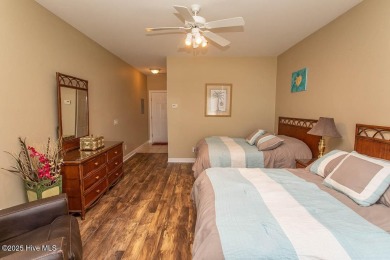 Incredibly well-maintained top floor condo overlooking the golf on Sea Trail Golf Resort in North Carolina - for sale on GolfHomes.com, golf home, golf lot