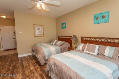 Incredibly well-maintained top floor condo overlooking the golf on Sea Trail Golf Resort in North Carolina - for sale on GolfHomes.com, golf home, golf lot