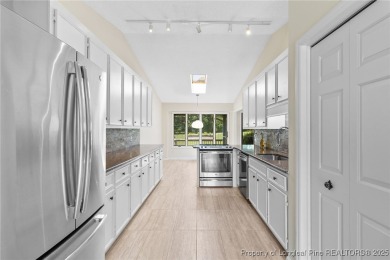 Beautiful flowing split bedroom ranch floor plan situated on the on Carolina Trace Country Club in North Carolina - for sale on GolfHomes.com, golf home, golf lot