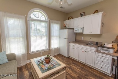Incredibly well-maintained top floor condo overlooking the golf on Sea Trail Golf Resort in North Carolina - for sale on GolfHomes.com, golf home, golf lot