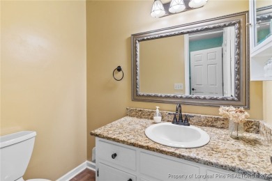 Beautiful flowing split bedroom ranch floor plan situated on the on Carolina Trace Country Club in North Carolina - for sale on GolfHomes.com, golf home, golf lot