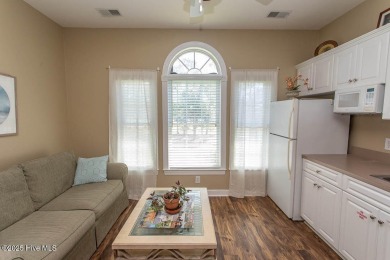 Incredibly well-maintained top floor condo overlooking the golf on Sea Trail Golf Resort in North Carolina - for sale on GolfHomes.com, golf home, golf lot