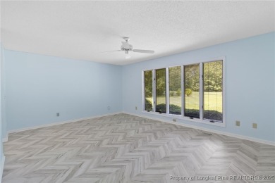 Beautiful flowing split bedroom ranch floor plan situated on the on Carolina Trace Country Club in North Carolina - for sale on GolfHomes.com, golf home, golf lot