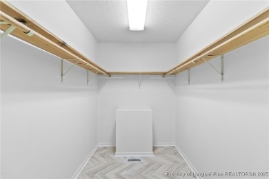 Beautiful flowing split bedroom ranch floor plan situated on the on Carolina Trace Country Club in North Carolina - for sale on GolfHomes.com, golf home, golf lot