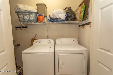 Incredibly well-maintained top floor condo overlooking the golf on Sea Trail Golf Resort in North Carolina - for sale on GolfHomes.com, golf home, golf lot