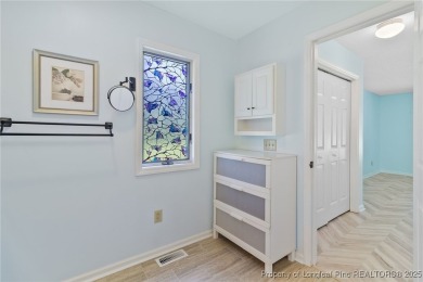 Beautiful flowing split bedroom ranch floor plan situated on the on Carolina Trace Country Club in North Carolina - for sale on GolfHomes.com, golf home, golf lot