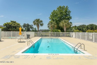 Incredibly well-maintained top floor condo overlooking the golf on Sea Trail Golf Resort in North Carolina - for sale on GolfHomes.com, golf home, golf lot