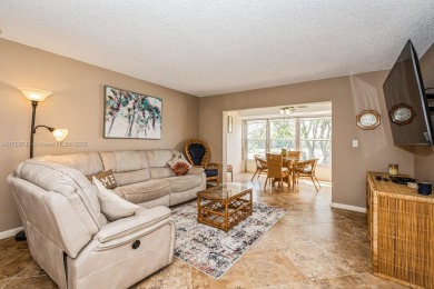 Step into the tranquility of this furnished 2 bedroom, 2 on Oriole Golf and Tennis Club in Florida - for sale on GolfHomes.com, golf home, golf lot