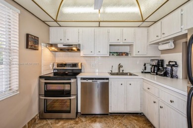 Step into the tranquility of this furnished 2 bedroom, 2 on Oriole Golf and Tennis Club in Florida - for sale on GolfHomes.com, golf home, golf lot