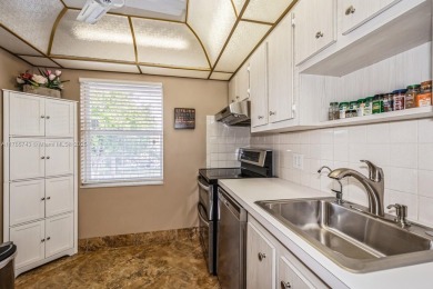 Step into the tranquility of this furnished 2 bedroom, 2 on Oriole Golf and Tennis Club in Florida - for sale on GolfHomes.com, golf home, golf lot