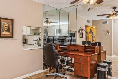 Step into the tranquility of this furnished 2 bedroom, 2 on Oriole Golf and Tennis Club in Florida - for sale on GolfHomes.com, golf home, golf lot