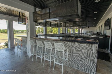 Incredibly well-maintained top floor condo overlooking the golf on Sea Trail Golf Resort in North Carolina - for sale on GolfHomes.com, golf home, golf lot