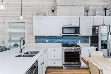 Welcome to Beachway Bungalows, Unit 5. Tucked in this quaint on Palmilla Beach Golf Club in Texas - for sale on GolfHomes.com, golf home, golf lot