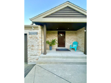 Stunning Stone and Cedar Ranch on a huge corner lot in desirable on White Pines Golf Course in Illinois - for sale on GolfHomes.com, golf home, golf lot