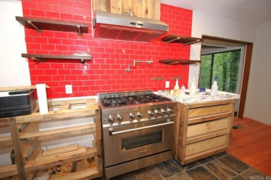 Remodel has been started leaving it up to a new buyer to on Cortez Golf Course in Arkansas - for sale on GolfHomes.com, golf home, golf lot