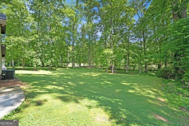 Perfectly located! This lovely home backs up to White Oak Golf on Canongate On White Oak Golf Course in Georgia - for sale on GolfHomes.com, golf home, golf lot