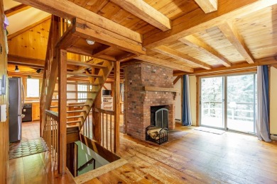 Tucked at the end of a quiet cul-de-sac, this post-and-beam cape on Eastman Golf Links in New Hampshire - for sale on GolfHomes.com, golf home, golf lot
