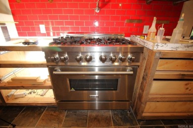Remodel has been started leaving it up to a new buyer to on Cortez Golf Course in Arkansas - for sale on GolfHomes.com, golf home, golf lot