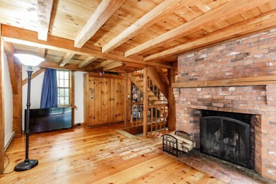 Tucked at the end of a quiet cul-de-sac, this post-and-beam cape on Eastman Golf Links in New Hampshire - for sale on GolfHomes.com, golf home, golf lot