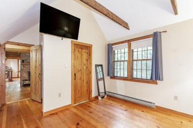 Tucked at the end of a quiet cul-de-sac, this post-and-beam cape on Eastman Golf Links in New Hampshire - for sale on GolfHomes.com, golf home, golf lot