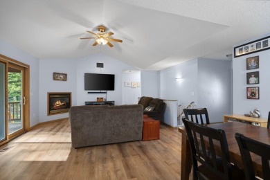 This beautifully designed home offers the perfect blend of on Michaywe Pines Course in Michigan - for sale on GolfHomes.com, golf home, golf lot