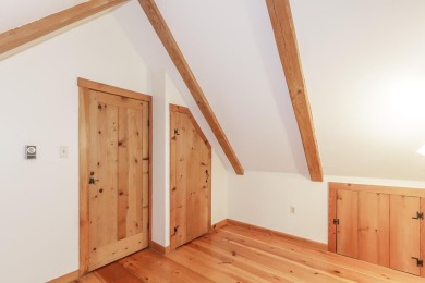Tucked at the end of a quiet cul-de-sac, this post-and-beam cape on Eastman Golf Links in New Hampshire - for sale on GolfHomes.com, golf home, golf lot